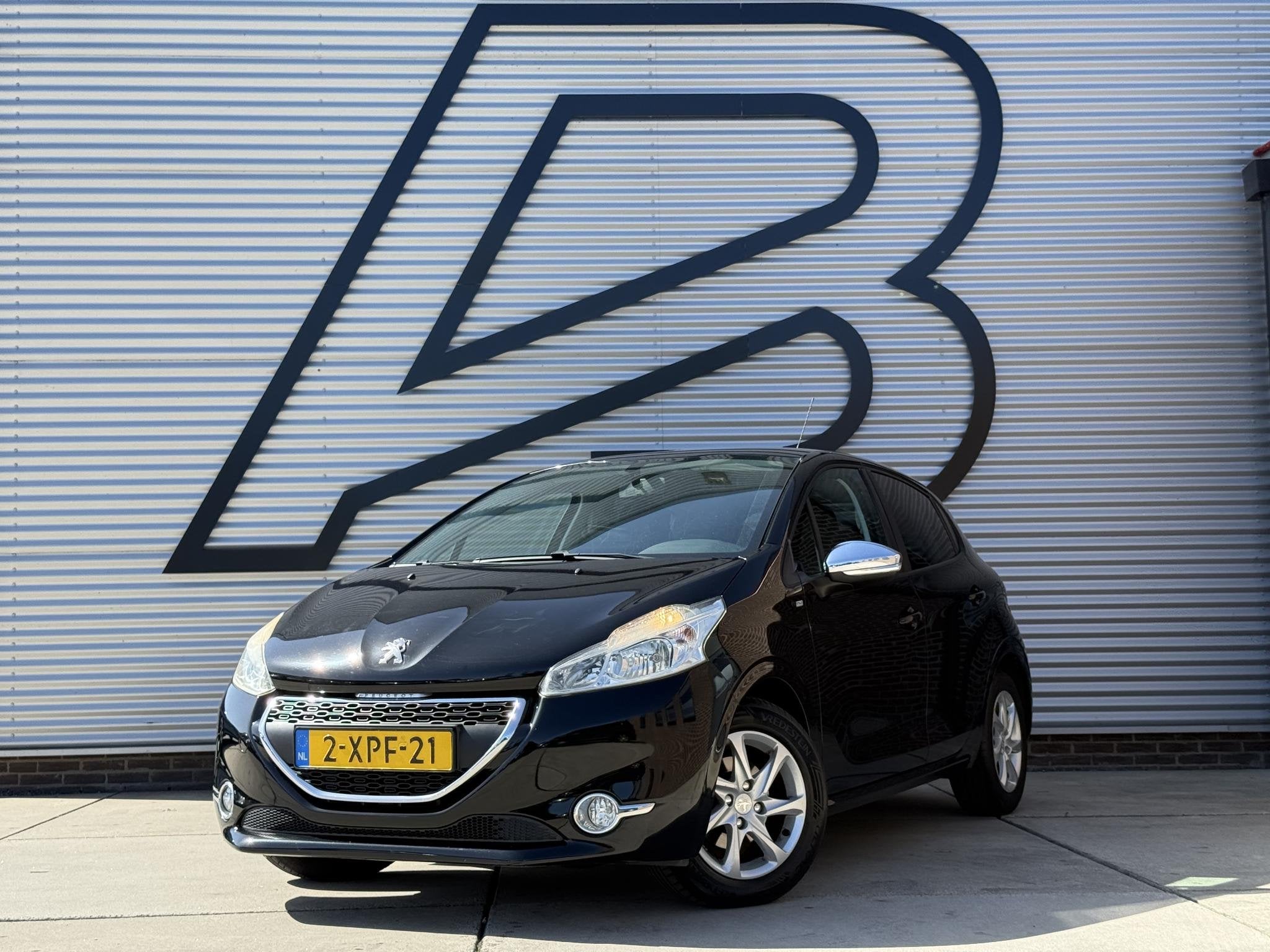 Peugeot 208 1.2 e-VTi Style Navi|Cruise|Airco|D-riem vv in 2, Stof, 1199 cc, 82 pk, Zwart