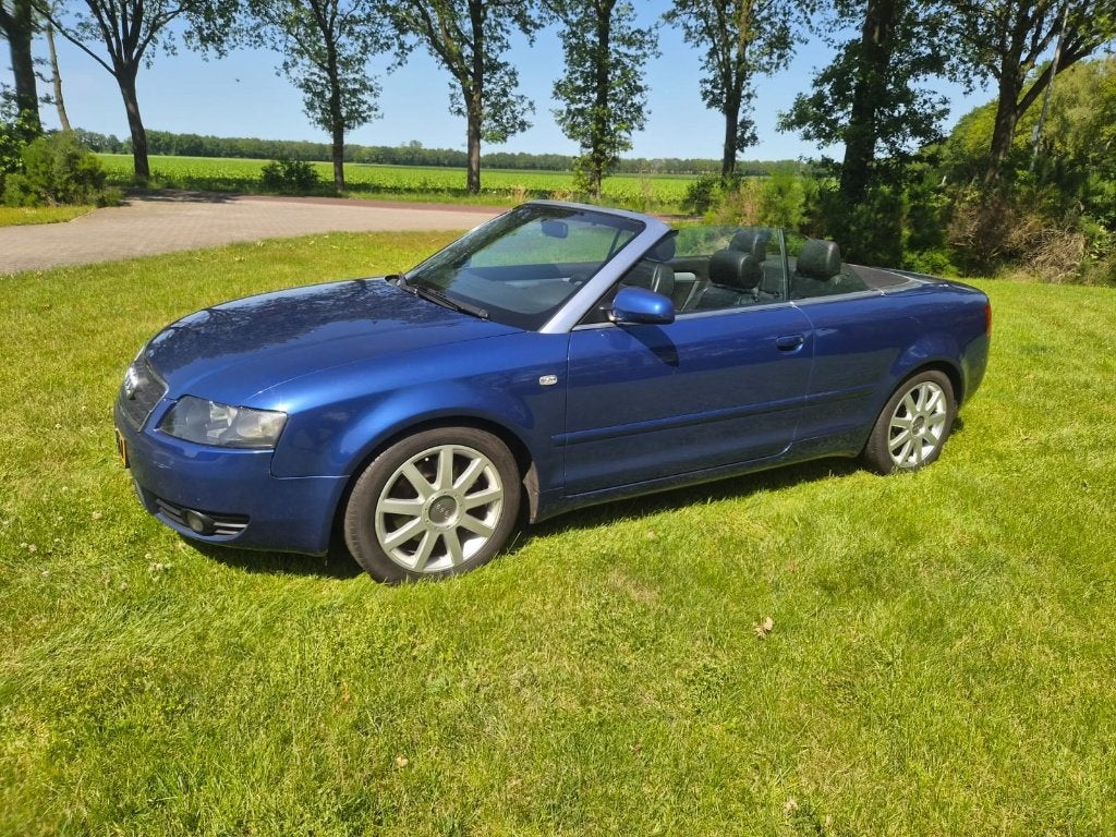 Audi A4 3.0 V6 162KW Cabrio AUT 2002 Blauw, Auto's, Audi, Parkeersensor, Zwart, 1595 kg, Cabriolet