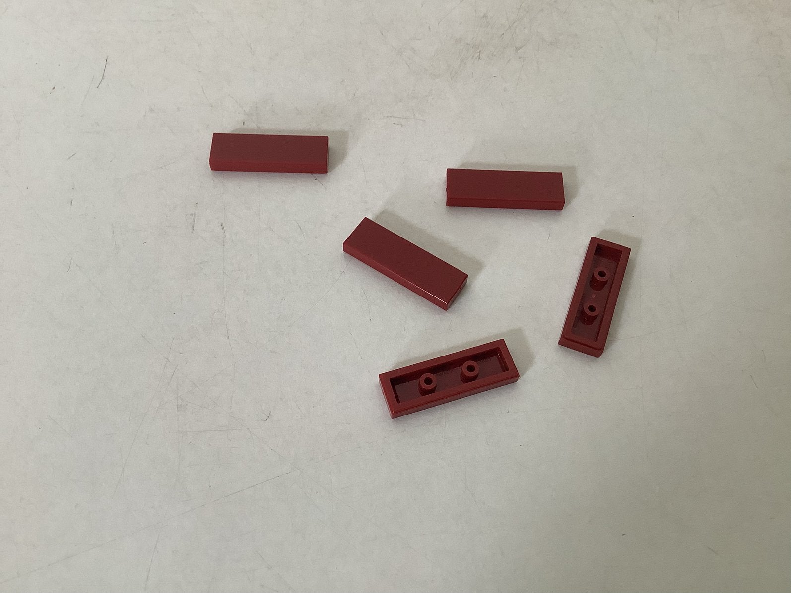Lego tegel 1x3 donker rood, Ophalen of Verzenden, Gebruikt, Losse stenen, Lego