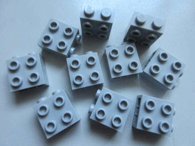 nr. 7509, 10 Stenen, lichtgrijs 1x2x2 met noppen aan zijkant, Ophalen of Verzenden, Zo goed als nieuw, Losse stenen, Lego