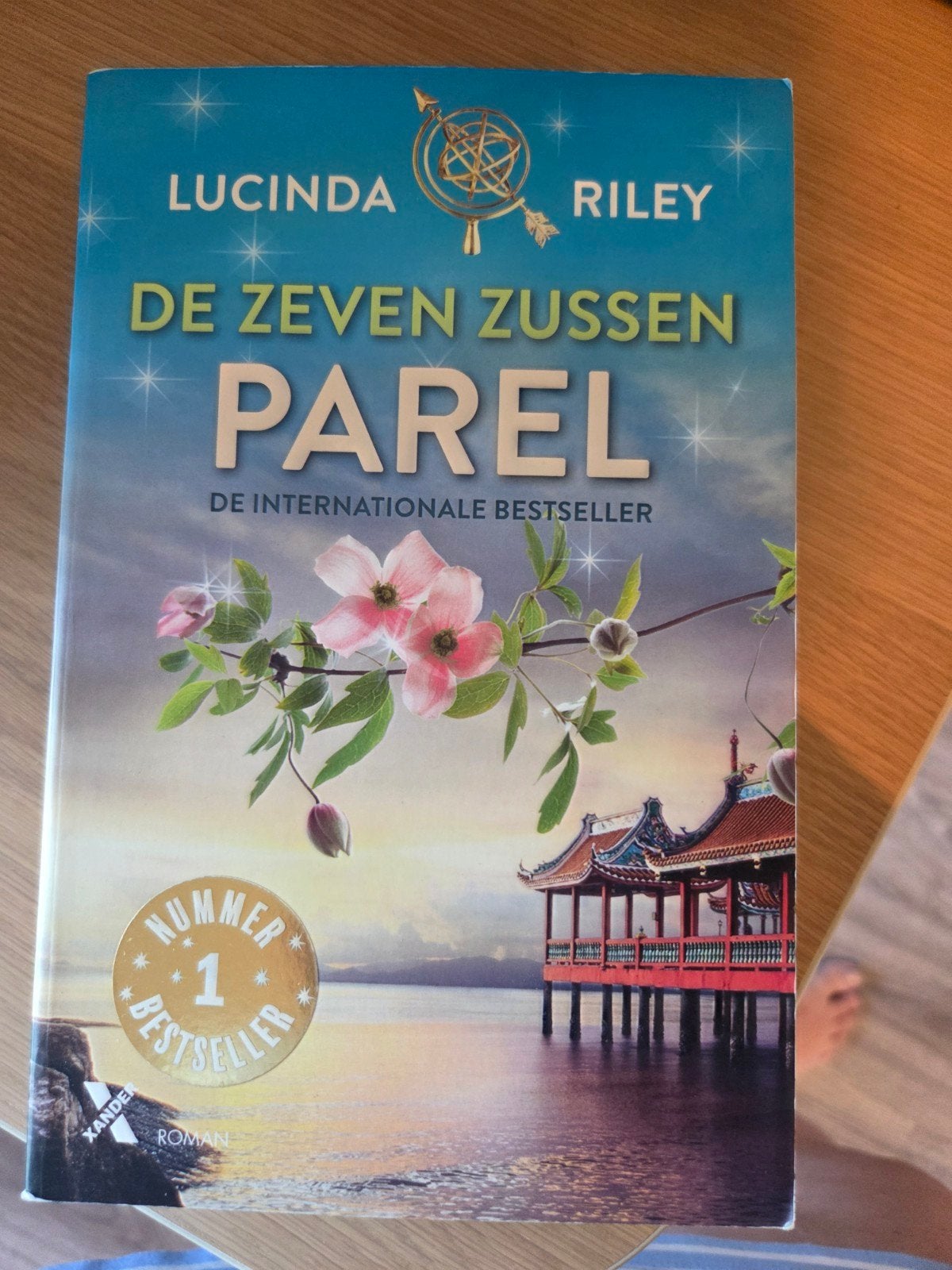 De Zeven Zussen - Parel (Lucinda Riley), Ophalen of Verzenden, Zo goed als nieuw, Lucinda Riley, Europa overig
