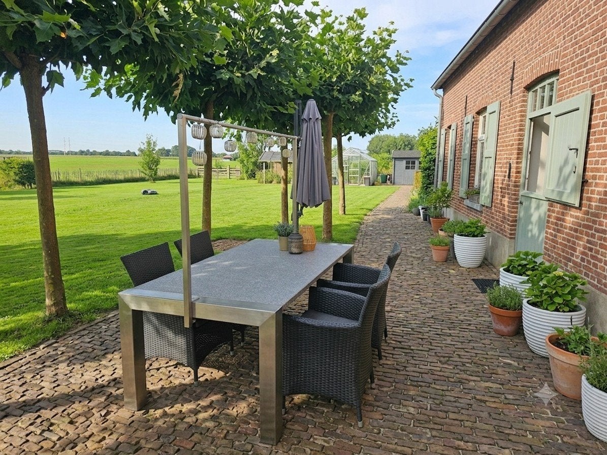 Natuurstenen tuintafel met brede RVS poten, Tuin en Terras, Tuintafels, Ophalen