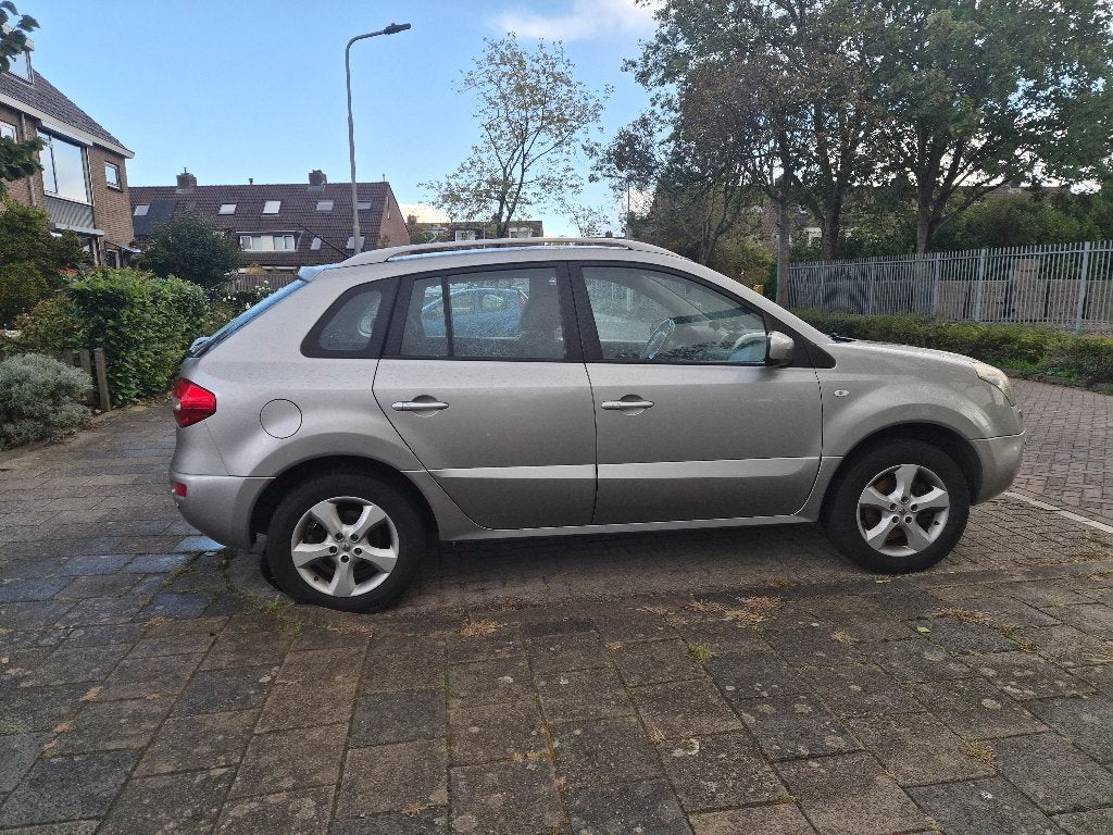 Renault Koleos 2.5 16V 126KW 4X2 2009 Grijs, Auto's, Voorwielaandrijving, Koleos, 4 cilinders, 2000 kg