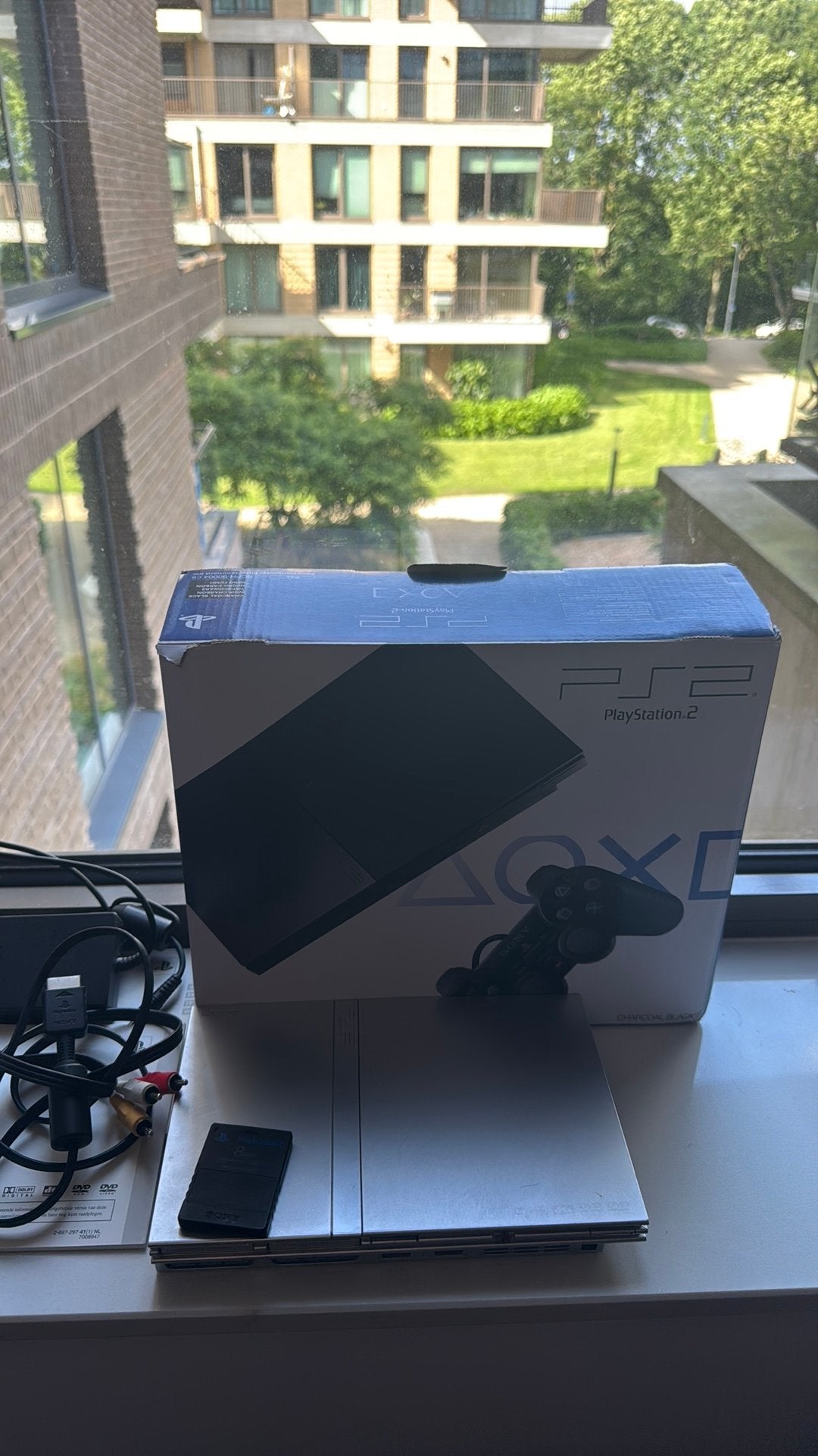 PlayStation 2 Slim Zilver met doos en toebehoren, Spelcomputers en Games, Spelcomputers | Sony PlayStation 2, Gebruikt, Ophalen of Verzenden