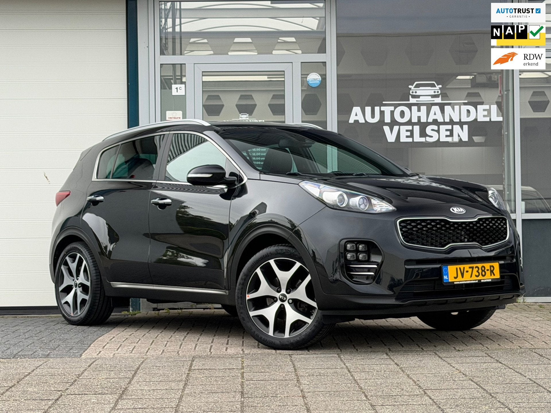 Kia Sportage 1.6 T-GDI 4WD GT-Line First Edition Automaat, Auto's, Gebruikt, 4 cilinders, Zwart, Bedrijf