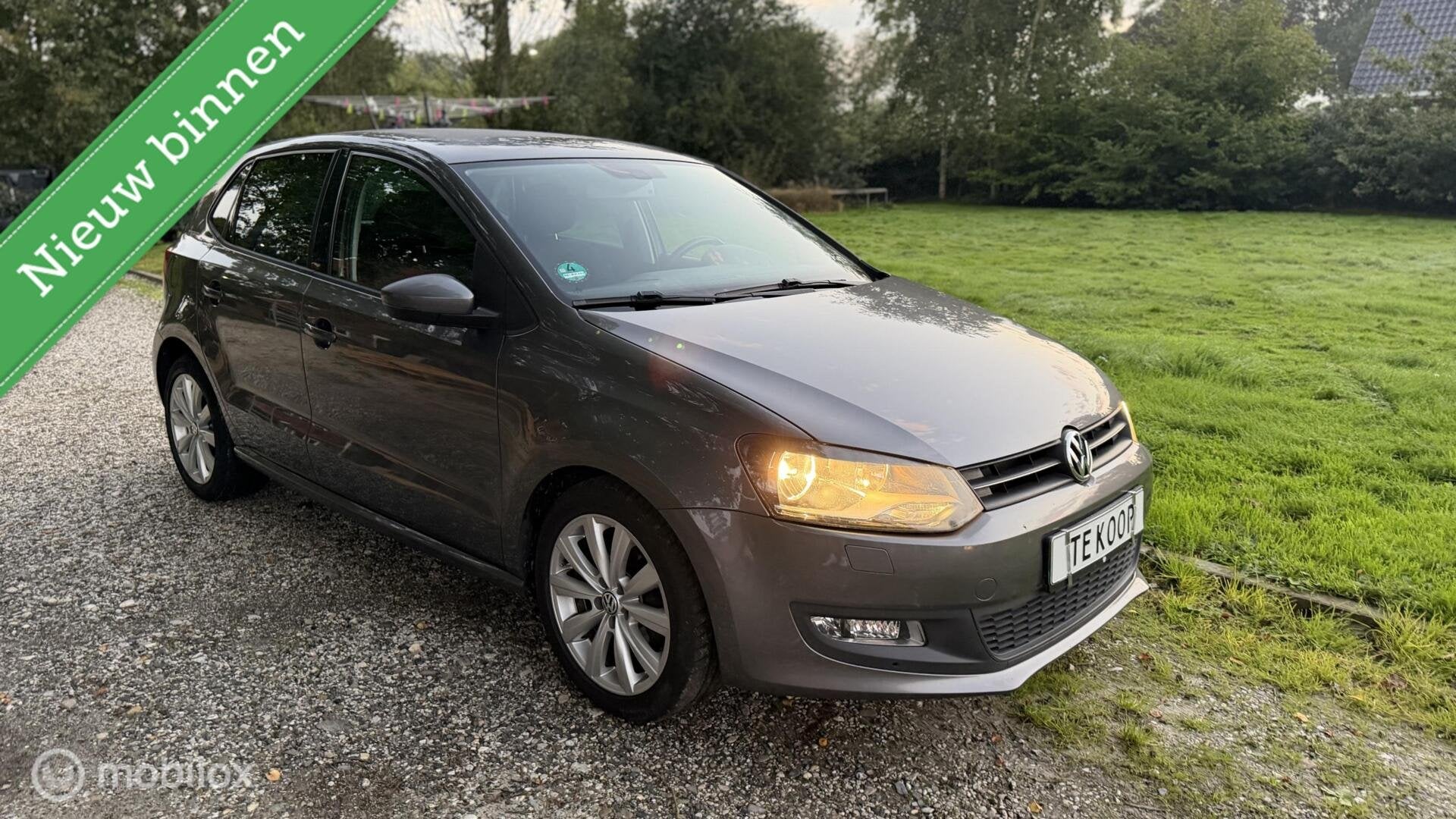 Volkswagen Polo 1.4 / 2011 / full option / nieuwe apk, Auto's, Voorwielaandrijving, 970 kg, 86 pk, Gebruikt
