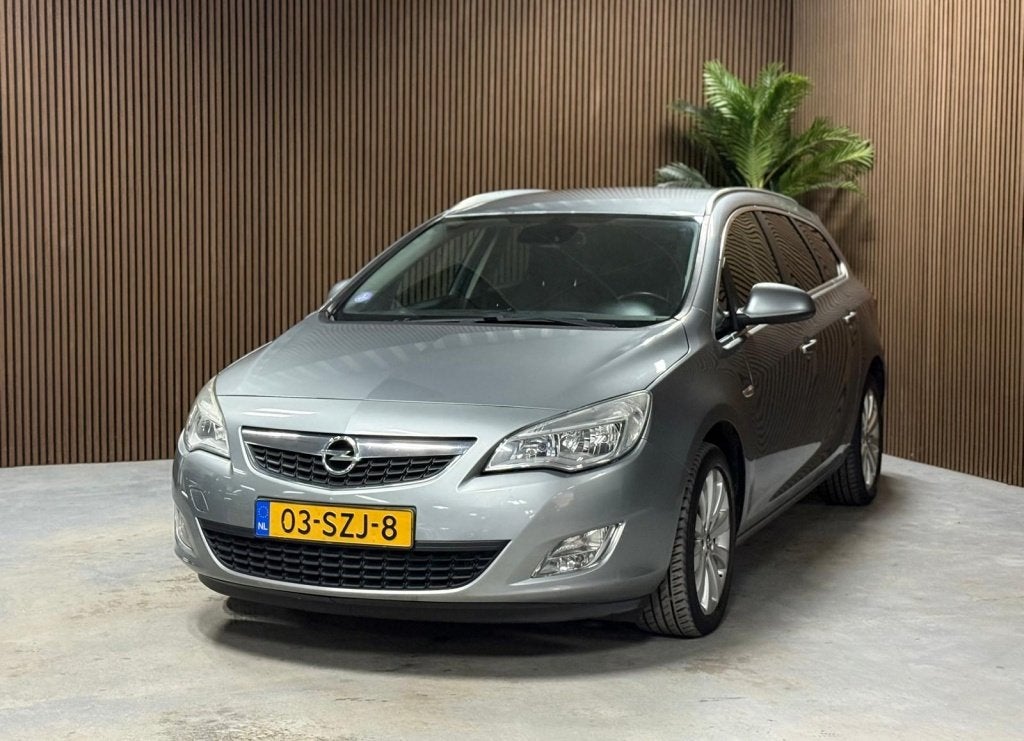 Opel Astra Sports Tourer 1.4 Turbo Cosmo (bj 2011), Auto's, Voorwielaandrijving, Gebruikt, 4 cilinders, 1337 kg