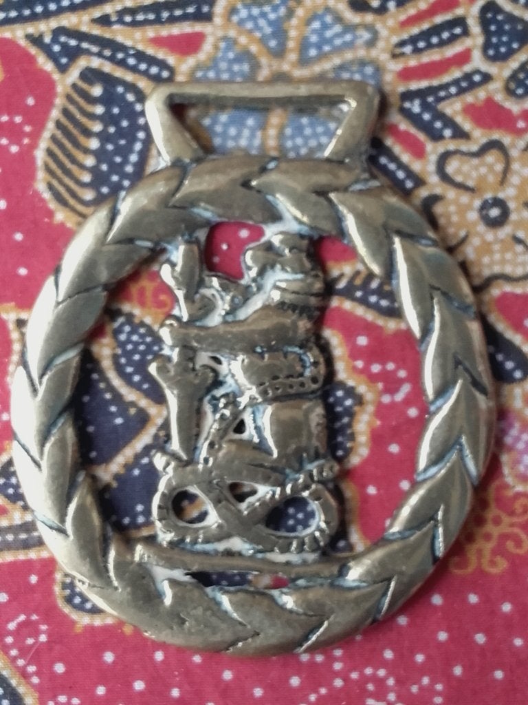 Zeldzaam antiek kleppermannetje uit Engeland met een leeuw.