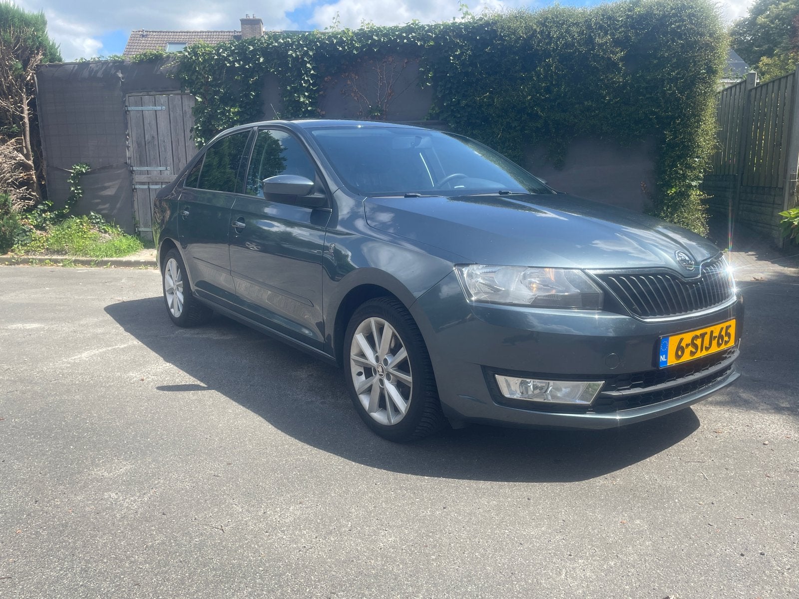 Skoda Rapid 1.2 TSI 105 pk Ambition Airco/Cruise/Trekhaak, Voorwielaandrijving, Euro 5, Stof, 49 €/maand