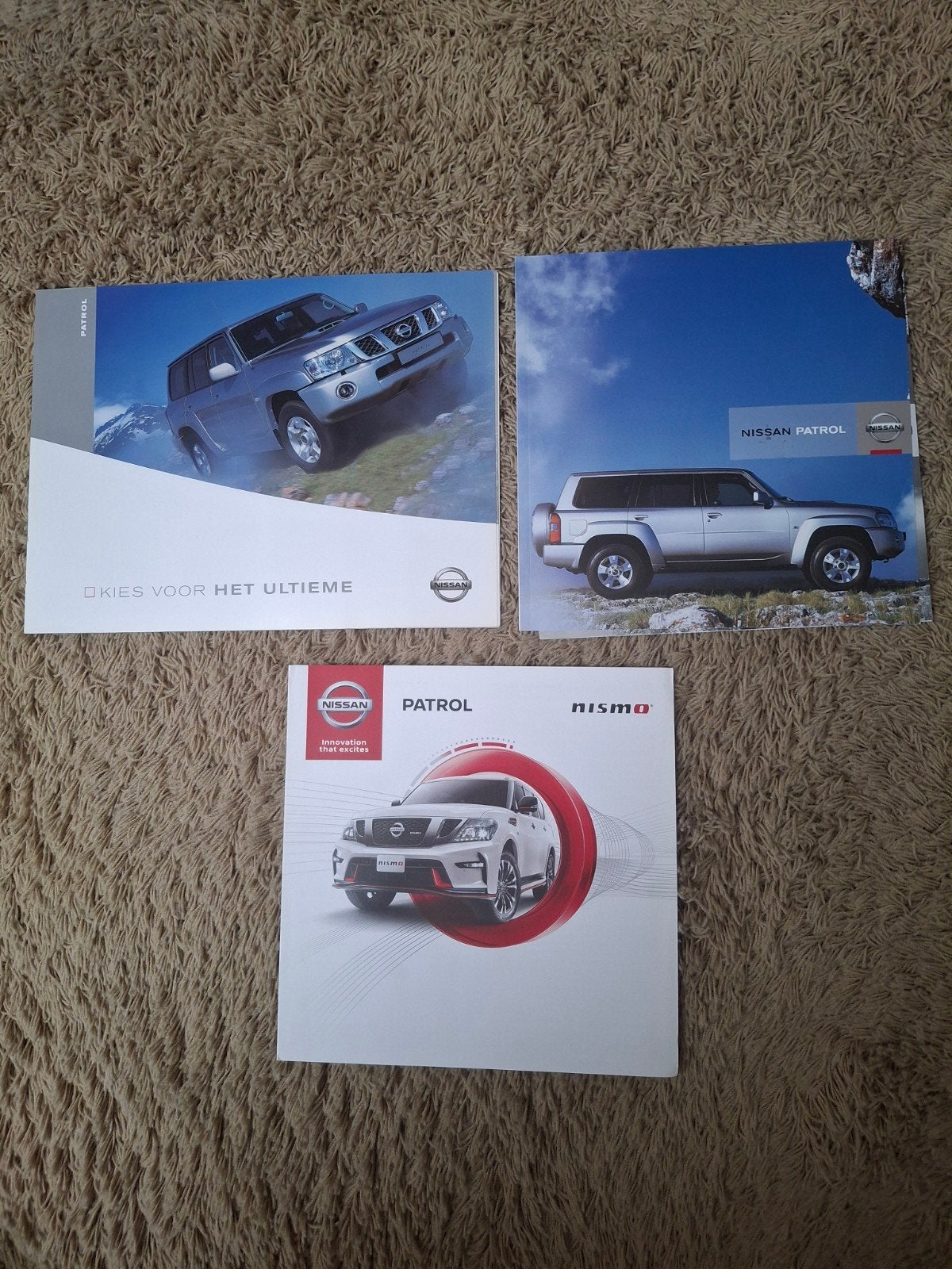 3x autofolder Nissan Patrol, Verzenden, Zo goed als nieuw, Nissan