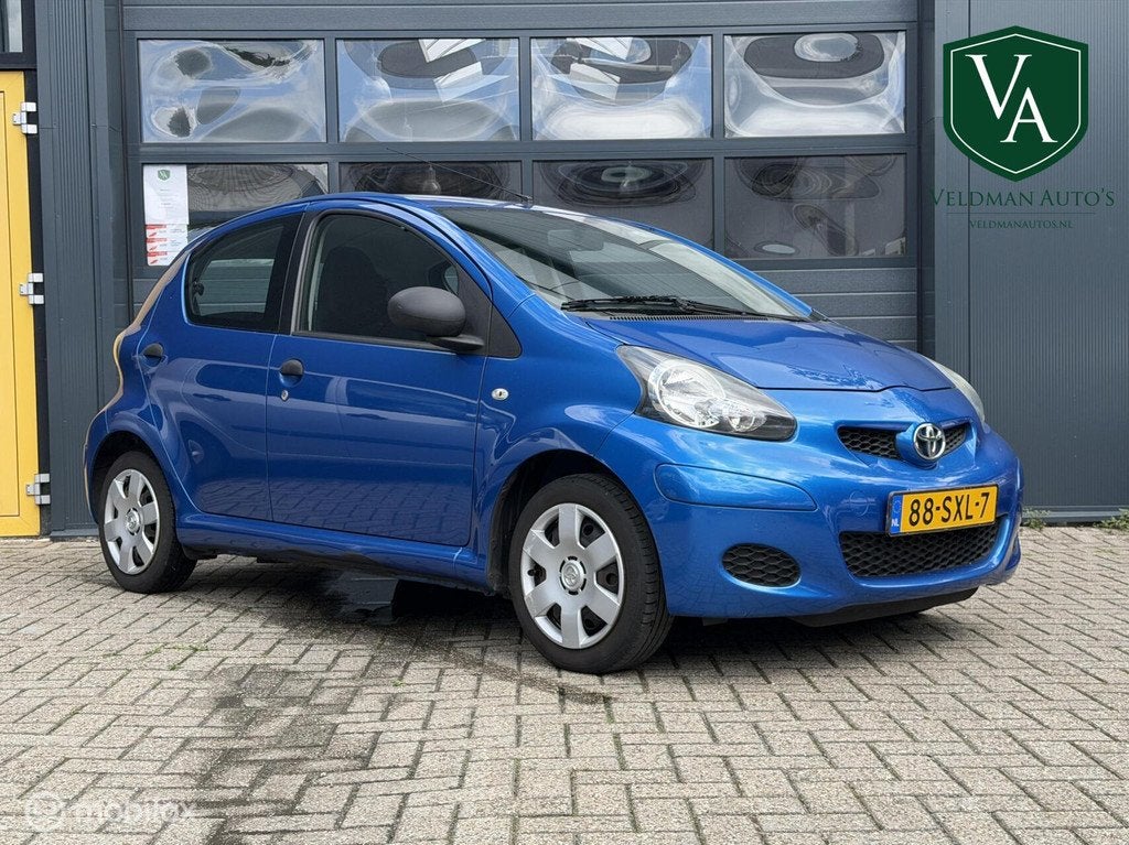 Toyota Aygo 1.0-12V Cool | Apple Carplay | navigatie |, Auto's, Toyota, Voorwielaandrijving, Euro 5, Gebruikt, 68 pk