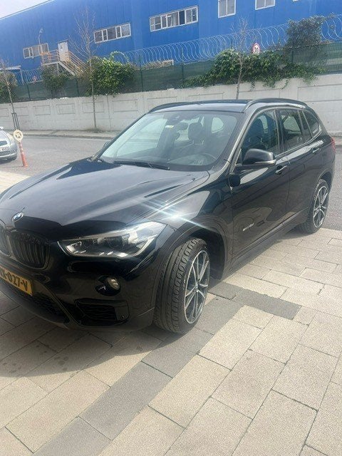 Foto 3 van BMW X1 Sdrive18d High Executive Aut 2017 Zwart