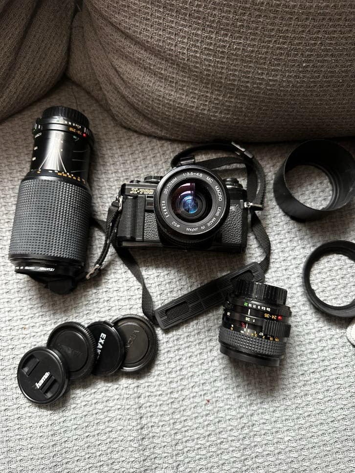 Minolta X-700 Spiegelreflexcamera met 3 zoom lenzen en tas, Audio, Tv en Foto, Fotocamera's Analoog, Ophalen of Verzenden, Gebruikt