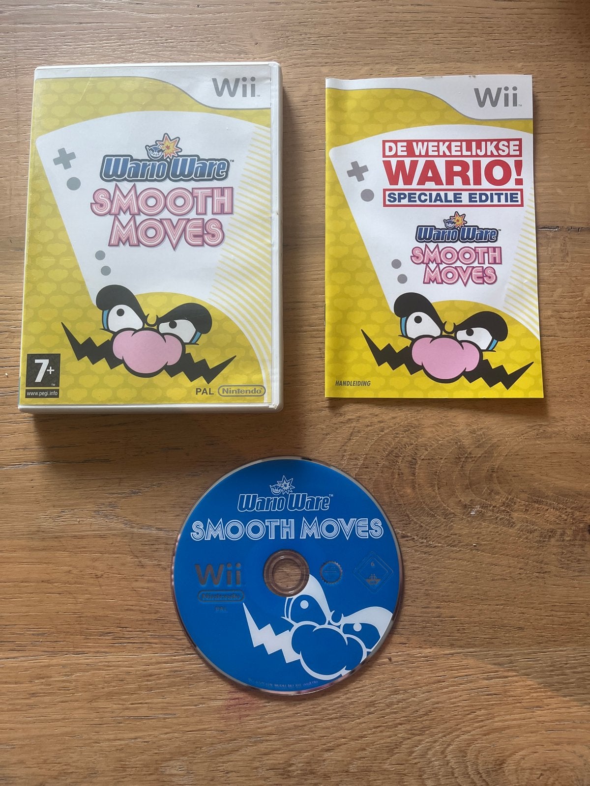 WarioWare Smooth Moves - Nintendo Wii - Compleet, Ophalen of Verzenden, Zo goed als nieuw, Overige genres, Vanaf 7 jaar