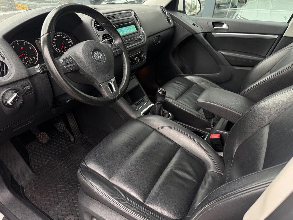 Volkswagen Tiguan 2.0 TSI Sport&Style 4Motion | Pano., Gebruikt, Zwart, 4 cilinders, 1984 cc