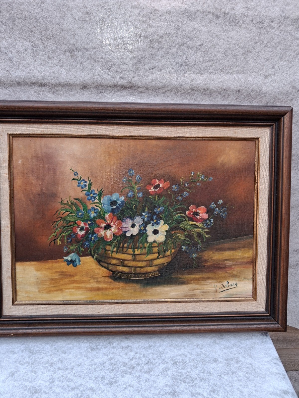 Schilderij met bloemenmand - gesigneerd 'Deboes', Ophalen of Verzenden