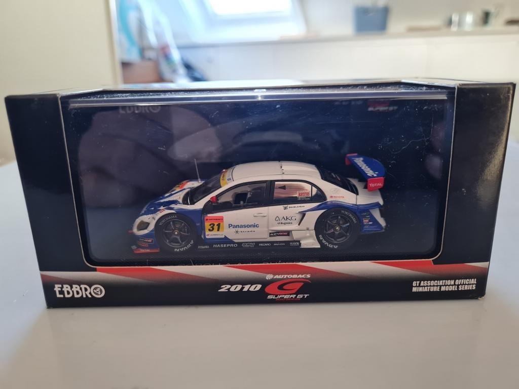 Toyota Corolla Axio Super GT 300 2010 1:43 (Ebbro), Ophalen of Verzenden, Nieuw, Auto, Overige merken