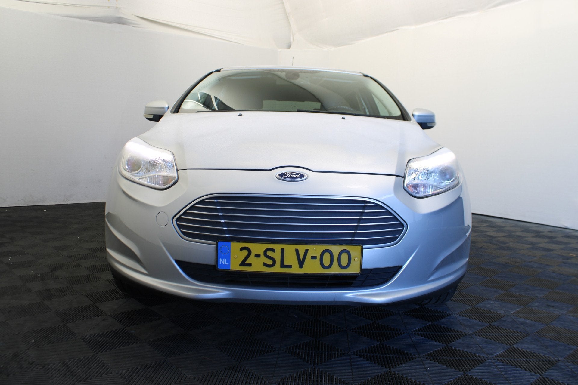 Ford Focus Titanium Electric (bj 2013, automaat), Stof, Gebruikt, Zwart, Origineel Nederlands