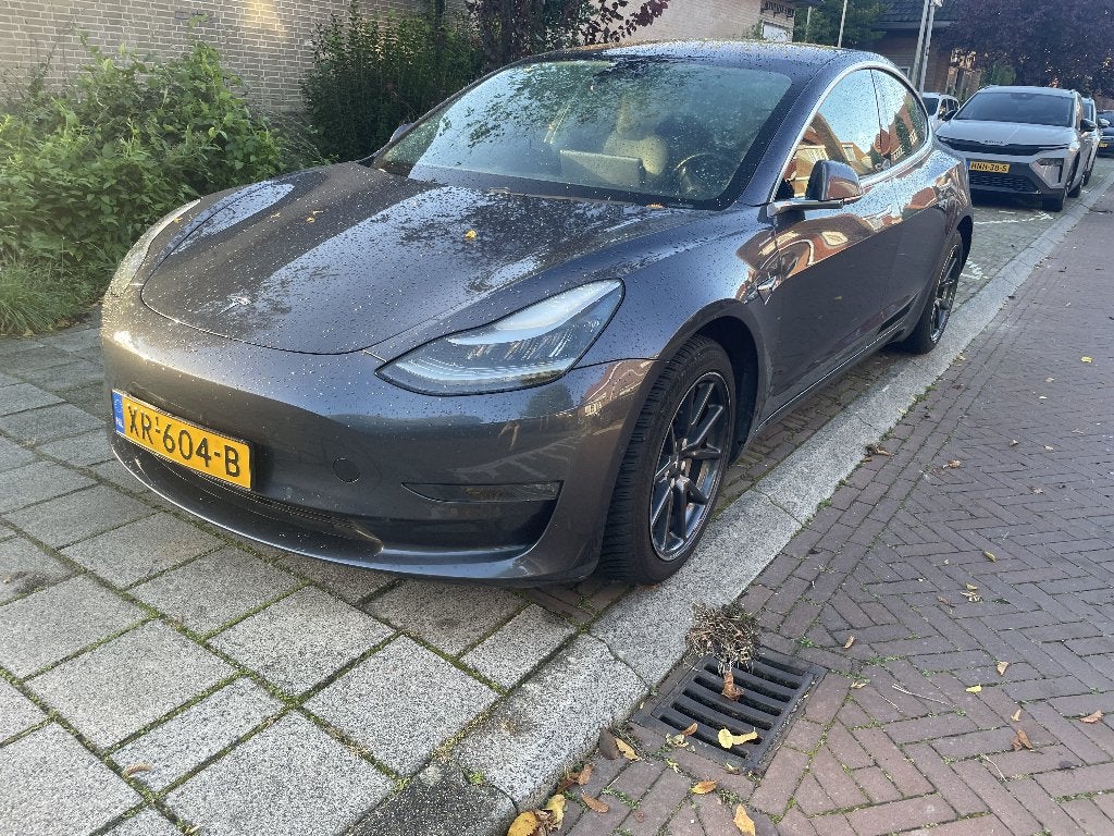 Tesla Model 3 2019 Long Range AWD, Auto's, Automaat, 1831 kg, Zwart, Origineel Nederlands