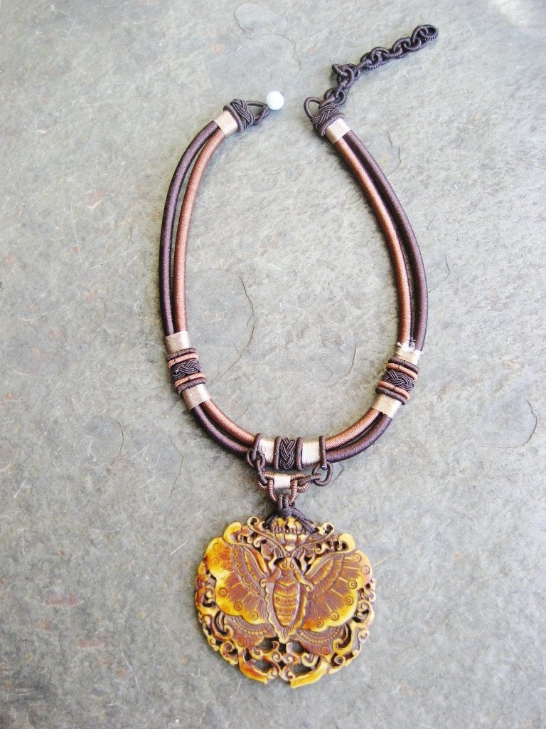 Antieke Ketting oud en onbeschadigd Vlinder afbeelding € 25, Ophalen of Verzenden, Overige materialen, Ketting