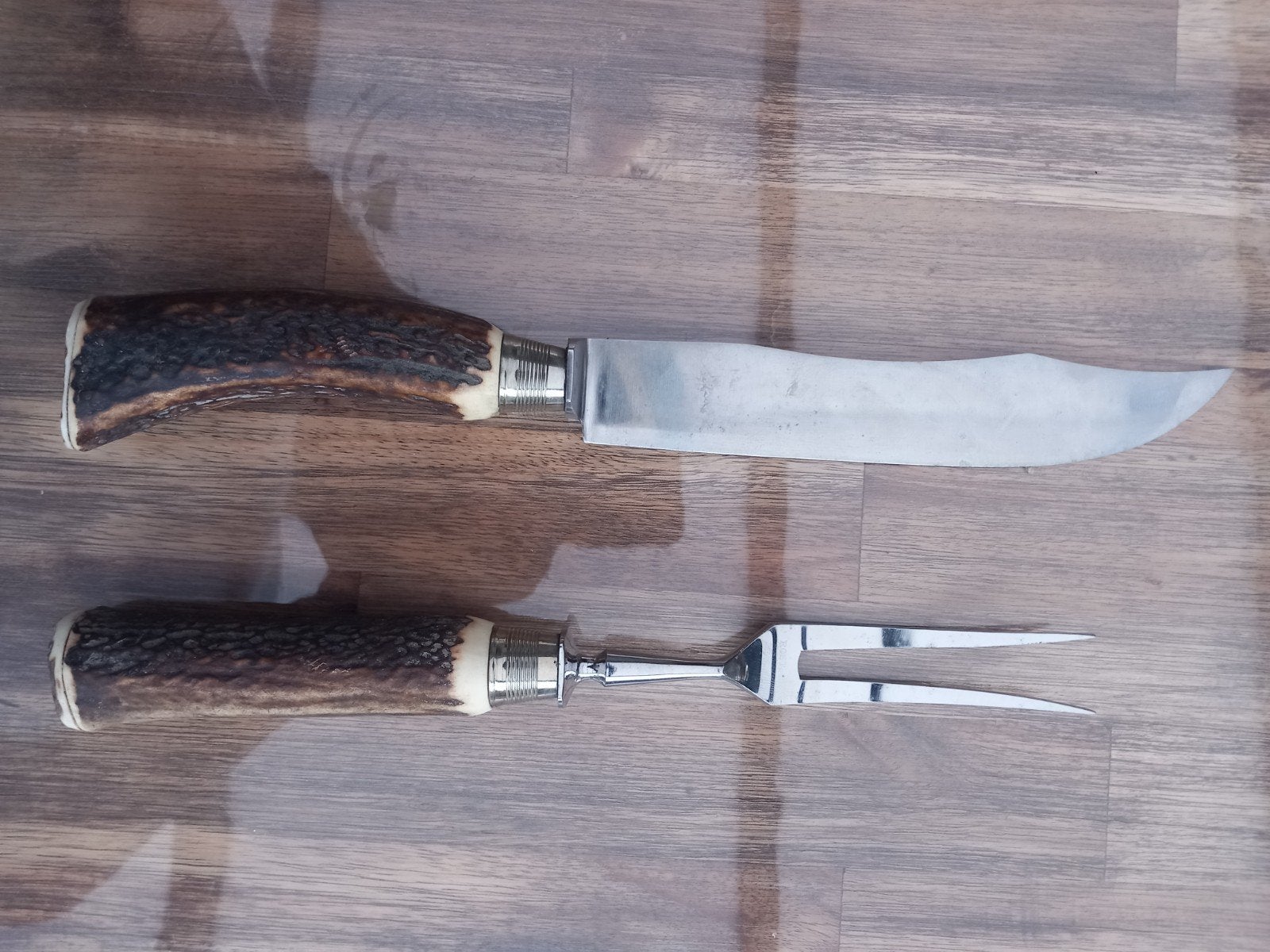 Vintage vleesmes en vork set met hertshoorn handvat, Ophalen of Verzenden