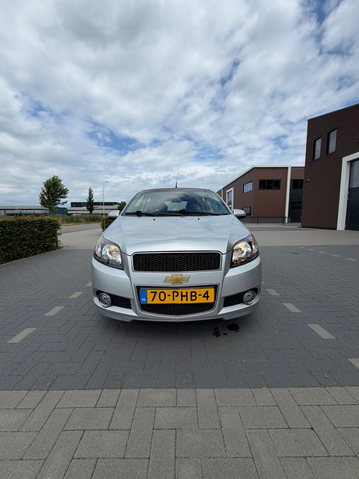 Chevrolet Aveo 1.2 LS+ 16V 5D 62KW 2011 Grijs, Auto's, Voorwielaandrijving, Stof, 40 €/maand, Aveo