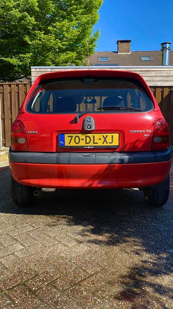 Opel Corsa 1.2 I 16V 3D 1999 Rood, Auto's, 450 kg, 850 kg, Origineel Nederlands, Handgeschakeld