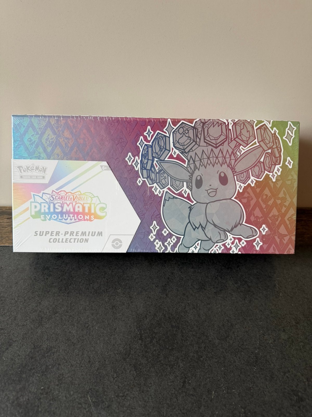 Pokemon Prismatic Evolutions Super Premium Collection SPC, Ophalen of Verzenden, Nieuw, Boosterbox, Foil