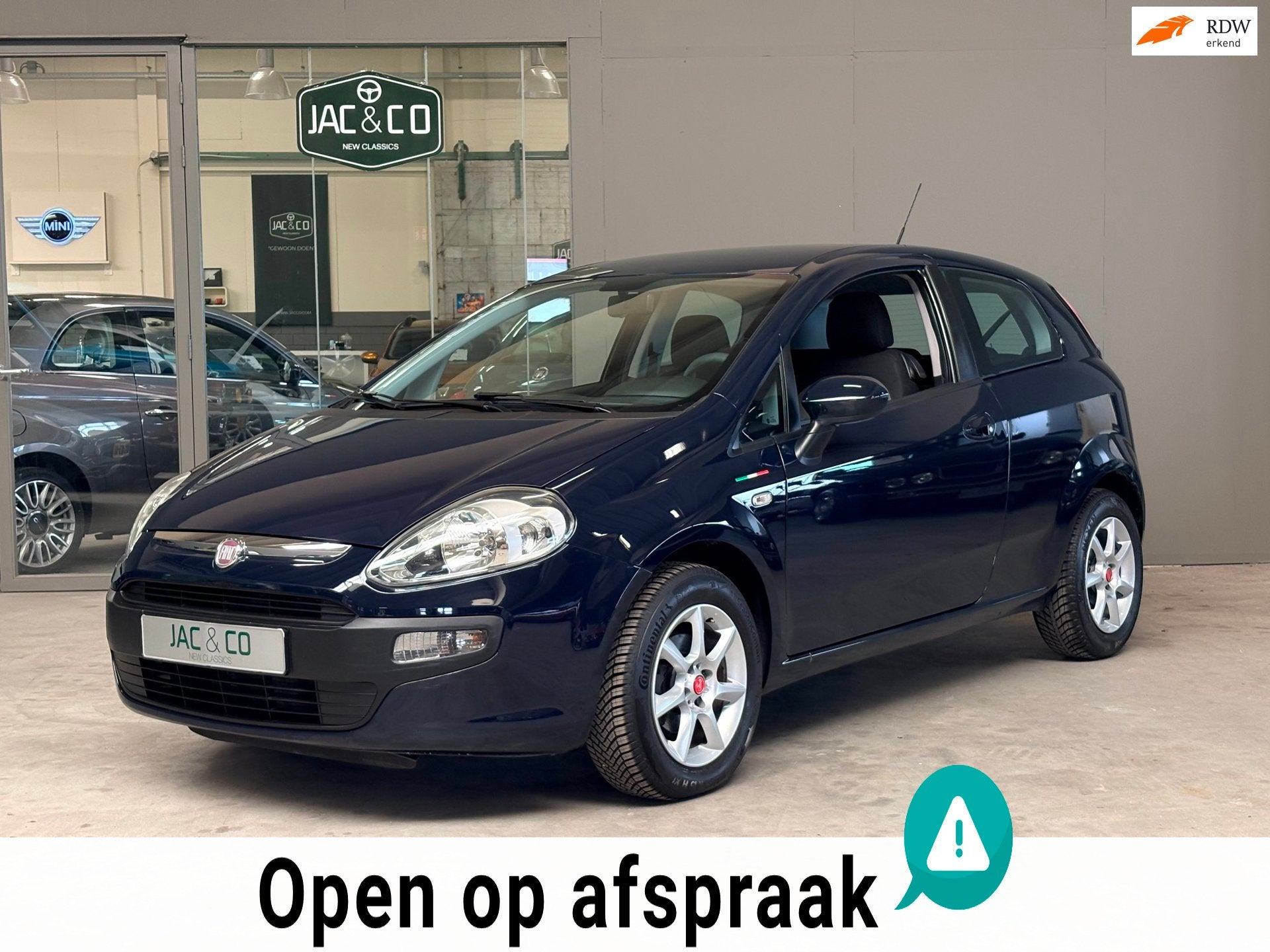 Fiat Punto 1.2 Dynamic airco en lage kilometerstand!, Voorwielaandrijving, Stof, Gebruikt, Zwart