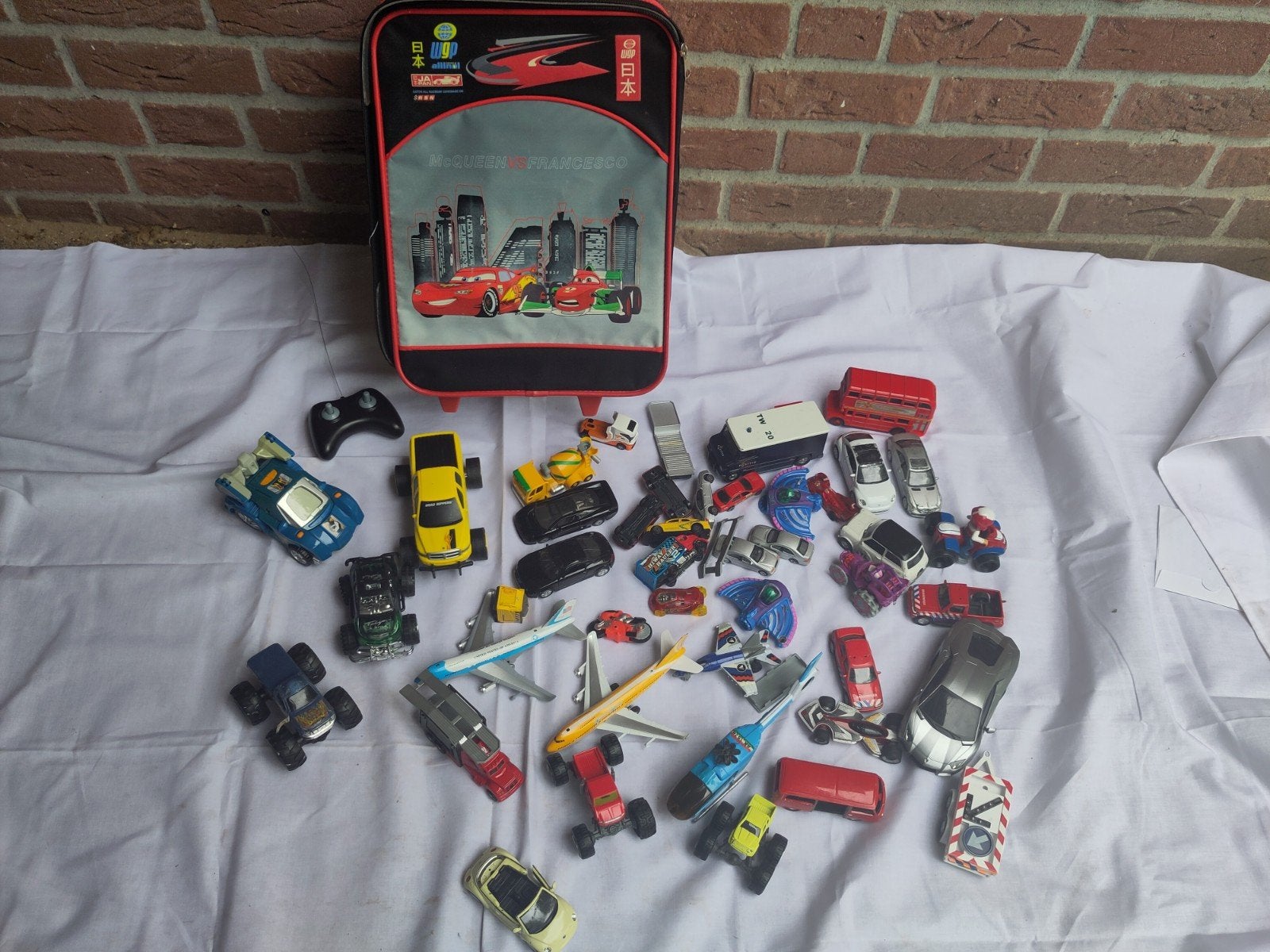 Collectie speelgoedauto's in Cars koffer, Ophalen of Verzenden