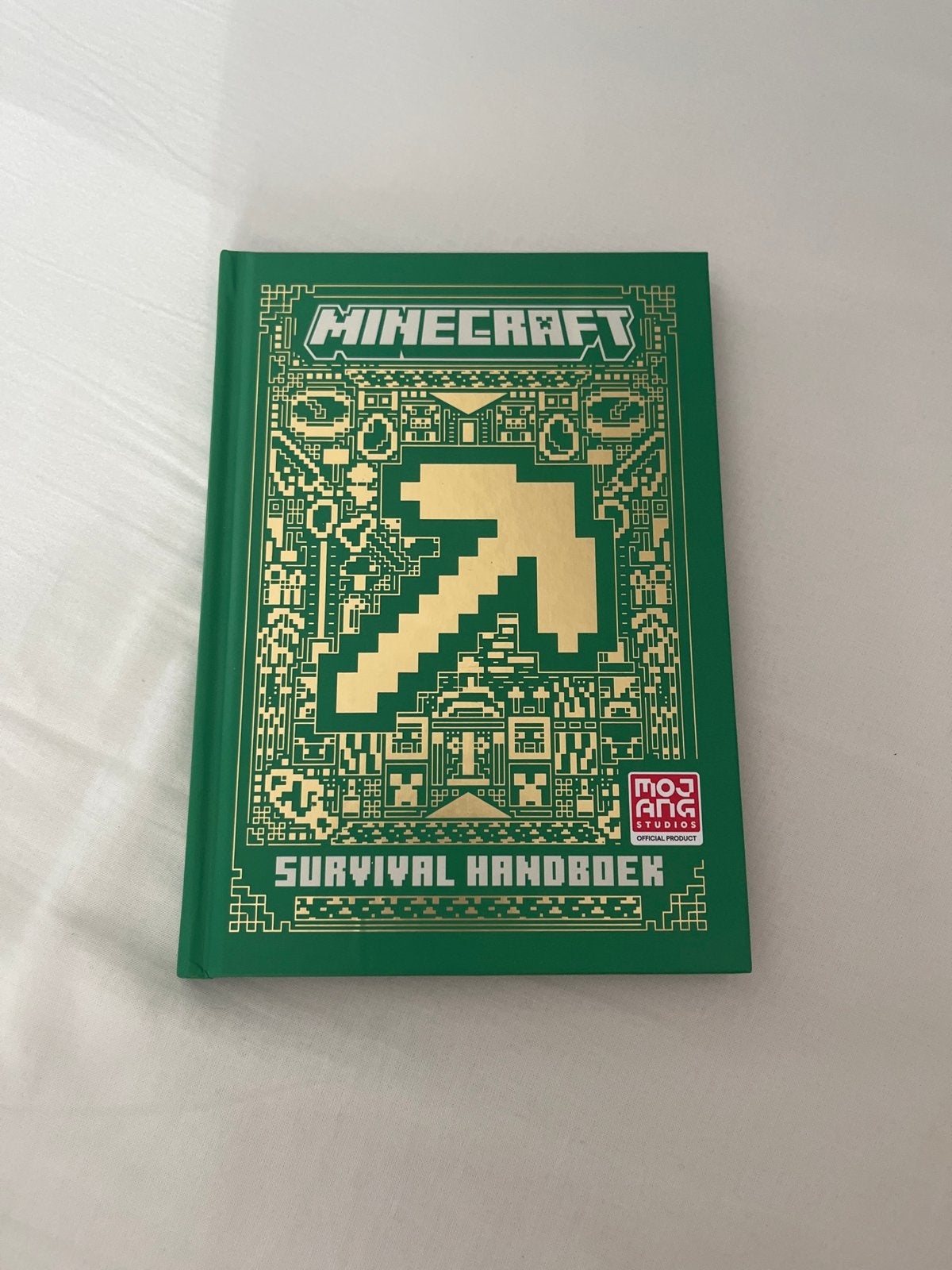Minecraft Survival Handboek - Leer overleven in Minecraft, Ophalen of Verzenden, Zo goed als nieuw, Non-fictie