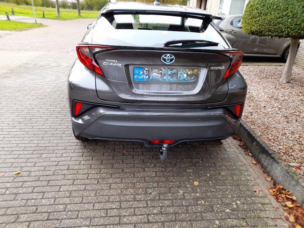 Toyota C-HR 1.8 Hybrid 122pk CVT 2023 Grijs, Auto's, Stof, 725 kg, Zwart, 4 cilinders