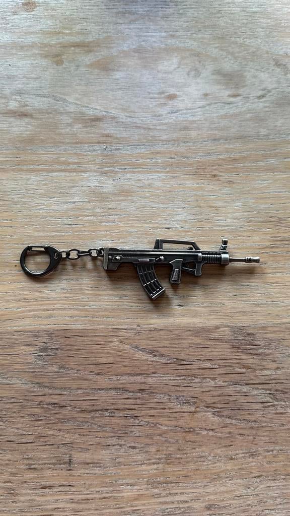 Gewapende Sleutelhanger - Uniek Design, Verzamelen, Sleutelhangers, Ophalen of Verzenden, Zo goed als nieuw, Overige typen