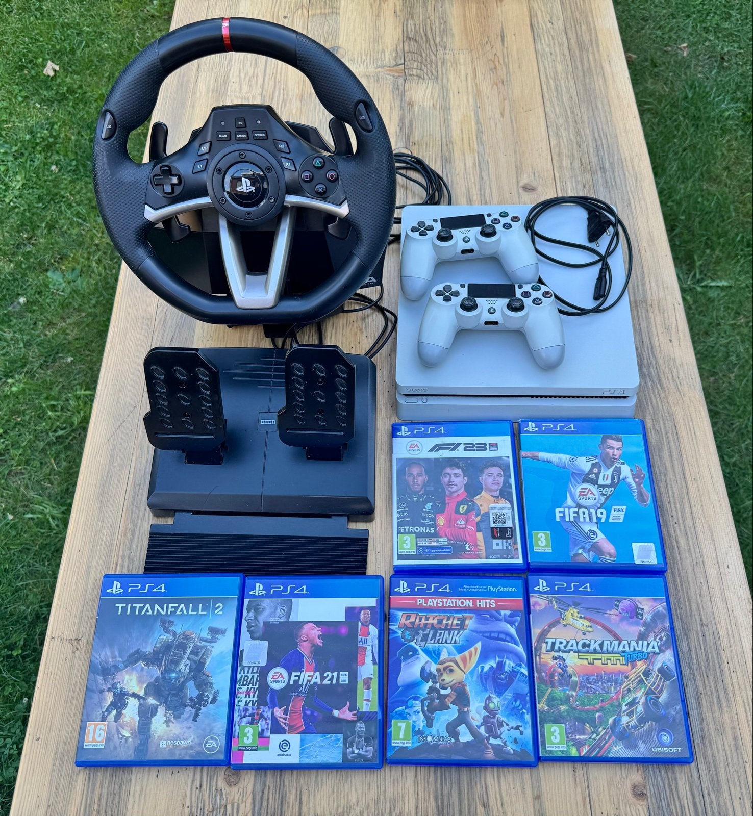 PS4 Slim 500GB met 2 controllers, stuur en 6 games, Met 2 controllers, Ophalen of Verzenden, Zo goed als nieuw, Slim