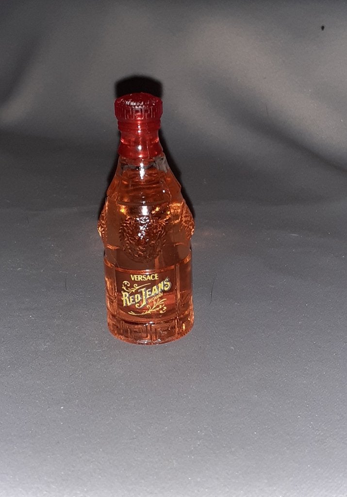 Mooie parfum mini -  Versace red jeans, Ophalen of Verzenden, Zo goed als nieuw, Miniatuur, Gevuld