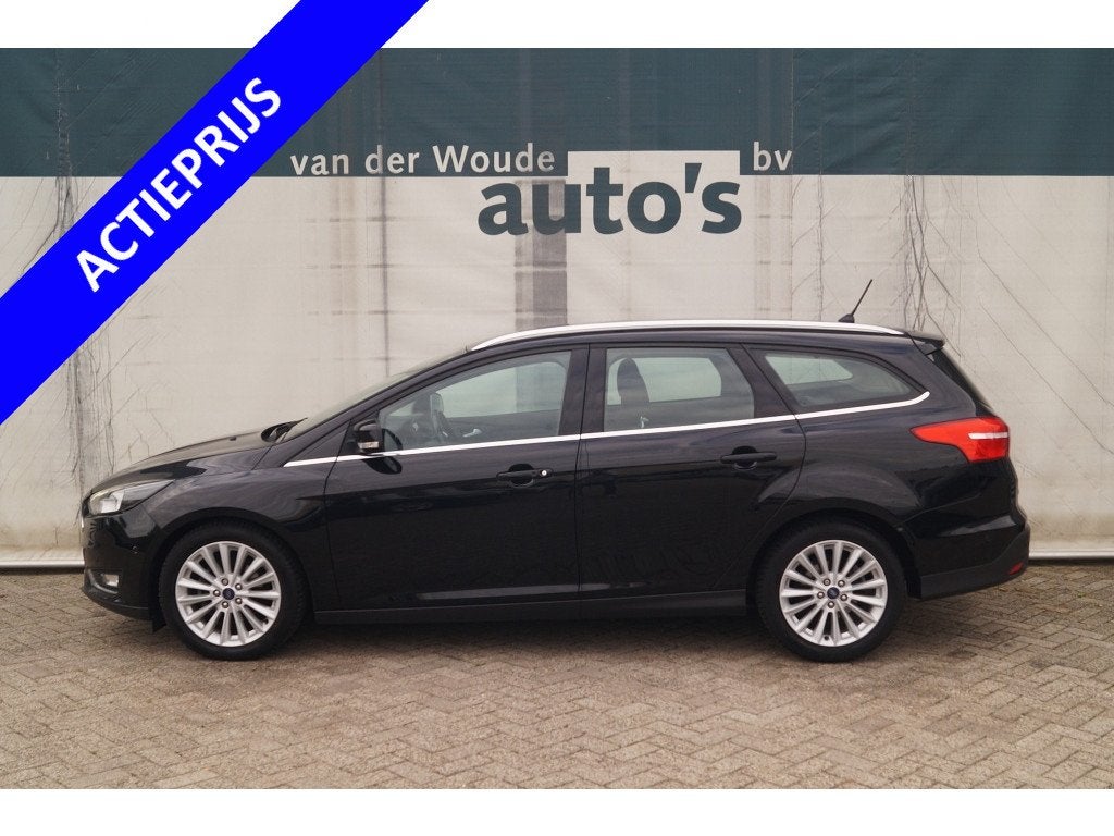 Ford Focus Wagon 1.0 125pk Titanium -NAVI-ECC-PDC-CAM-TREKHA, Gebruikt, Euro 6, Zwart, Origineel Nederlands