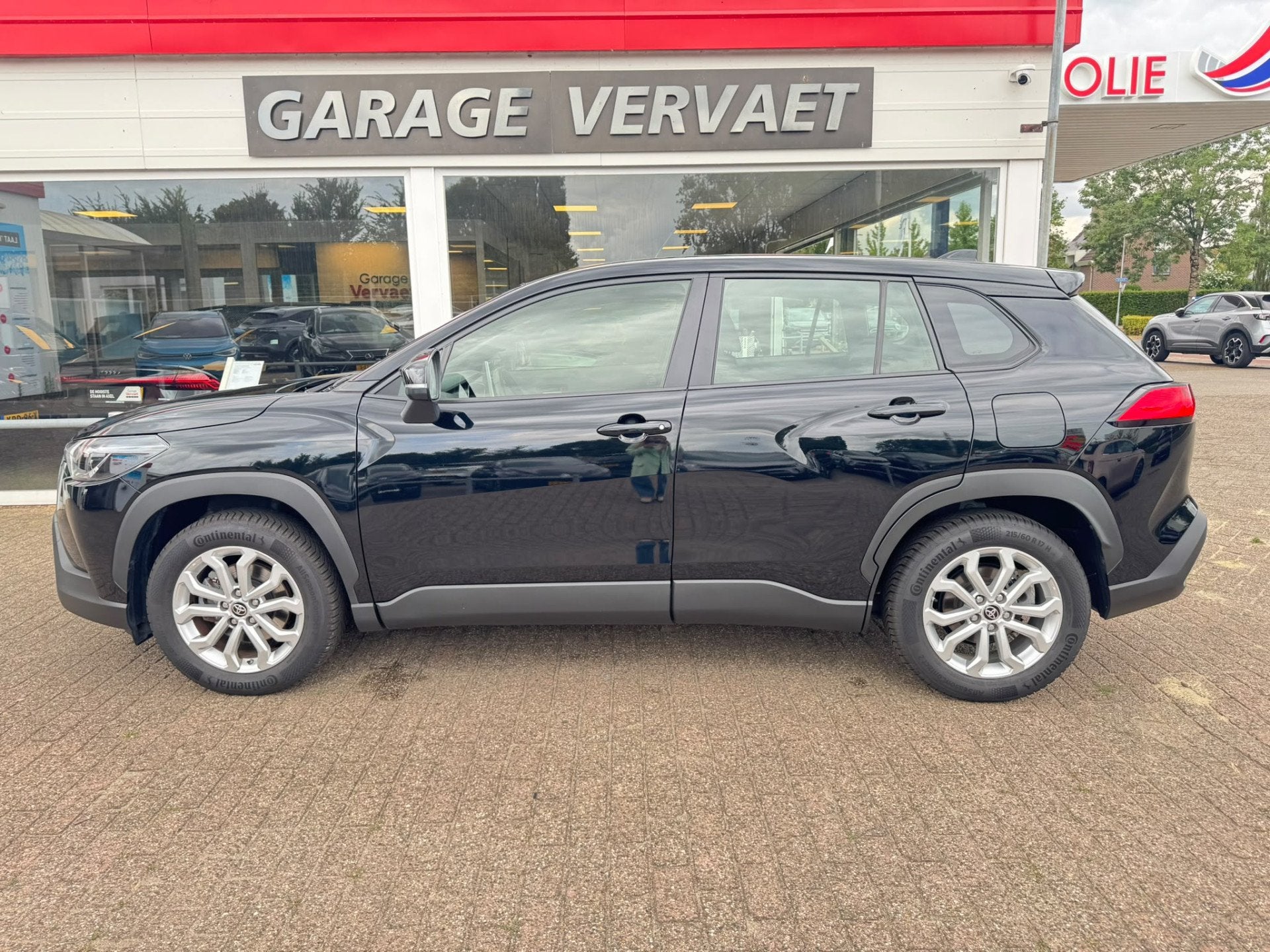 Toyota Corolla Cross 2.0 High Power Hybrid Active (bj 2023), Stof, 4 cilinders, Automatische klimaatregeling, Zwart