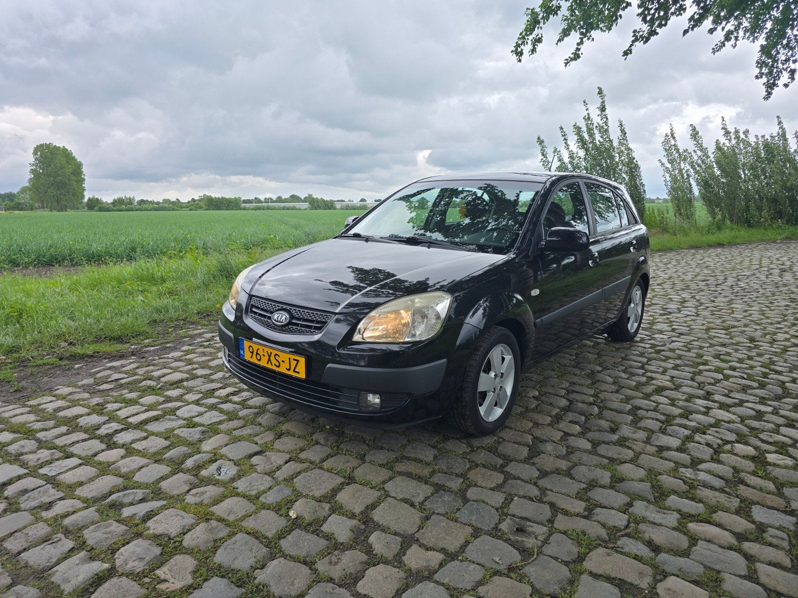 Kia Rio 1.4 HB 2007 Zwart, Auto's, Kia, Bedrijf, Rio, ABS, Airbags, Airconditioning, Alarm, Centrale vergrendeling, Elektrische ramen