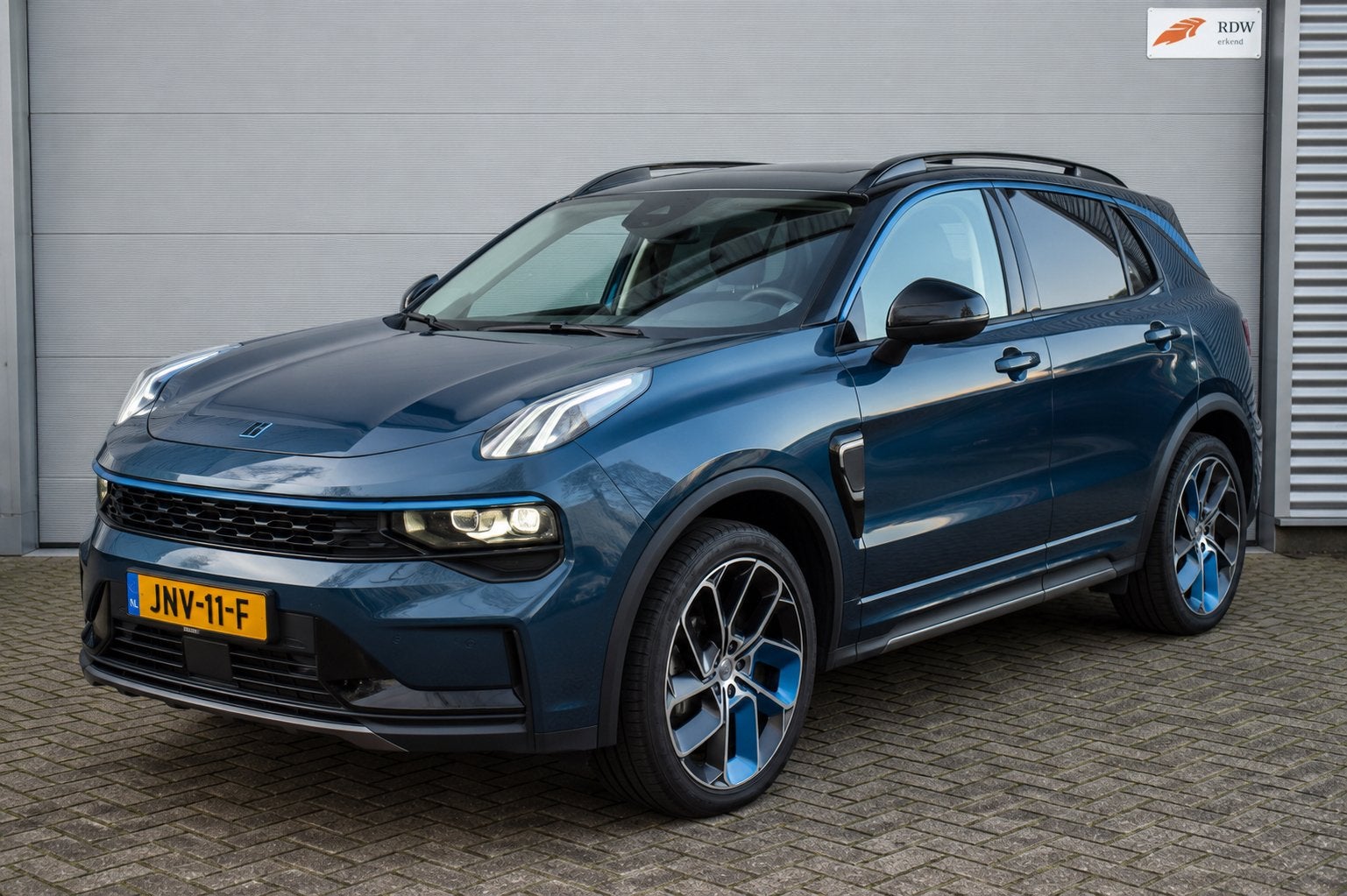 Lynk & Co 1.5TD 261pk Phev 7DCTH 2021 Blauw, Auto's, Lynk & Co, 1800 kg, Plug-in hybride, Lichtsensor, 1854 kg