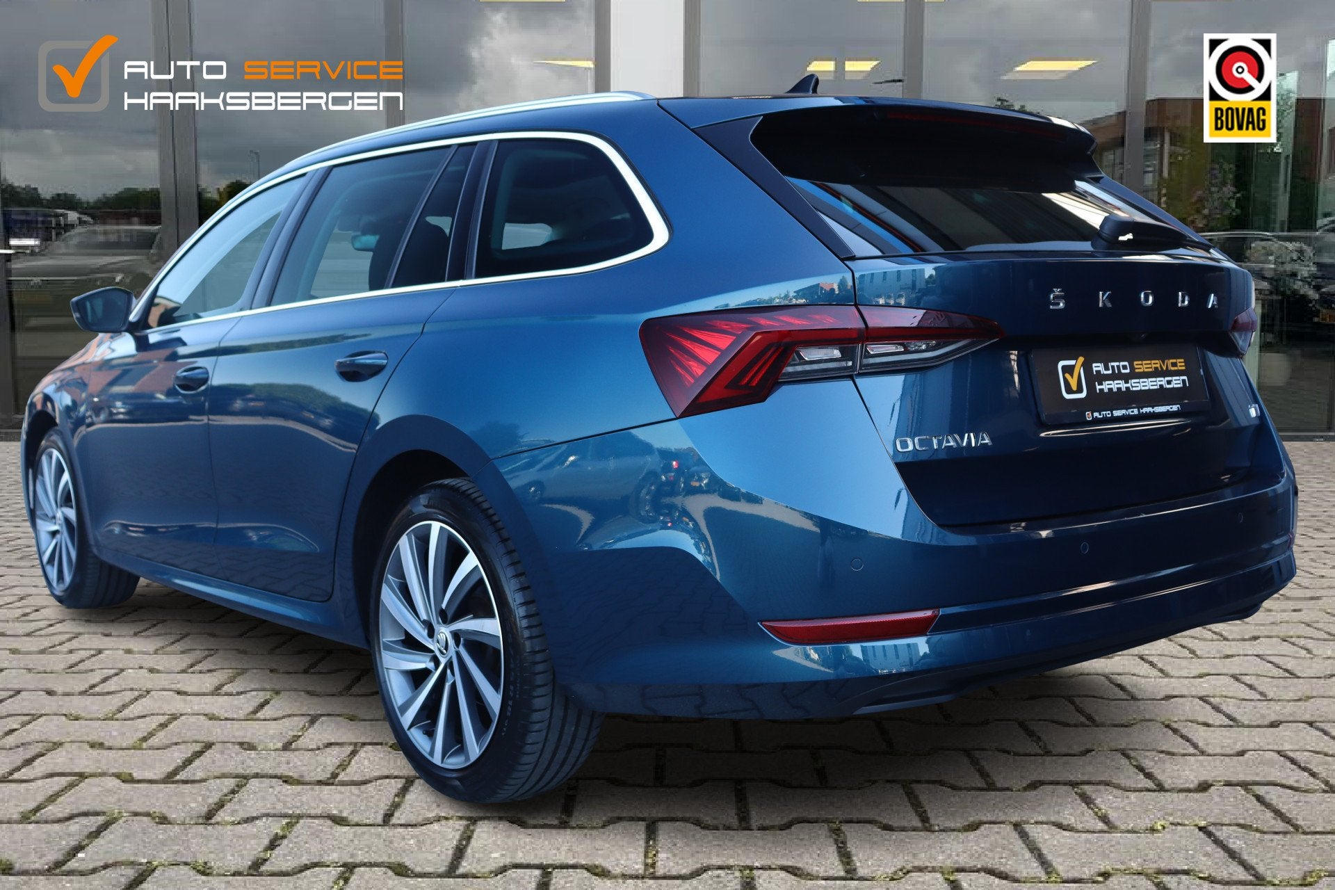 Skoda Octavia Combi 1.4 TSI iV PHEV Business Edition Plus |, Auto's, Stof, Gebruikt, Zwart, Blauw