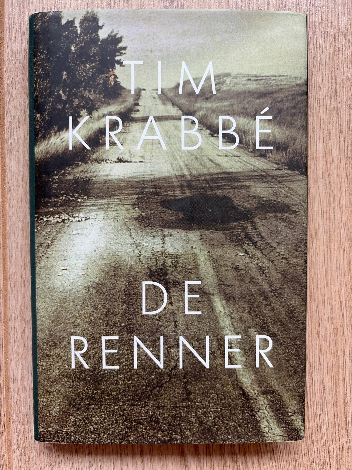 De Renner - Tim Krabbé (Boek), Ophalen of Verzenden, Gelezen, Nederland