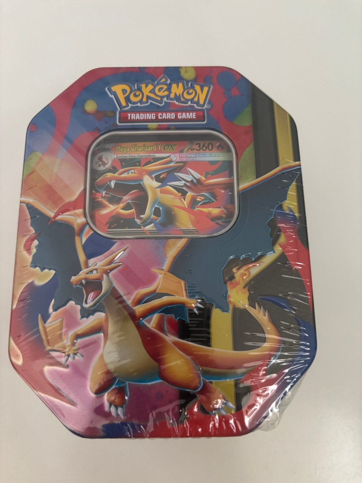 Pokémon Mega Evolution Charizard Tin, Ophalen of Verzenden, Nieuw, Booster, Foil