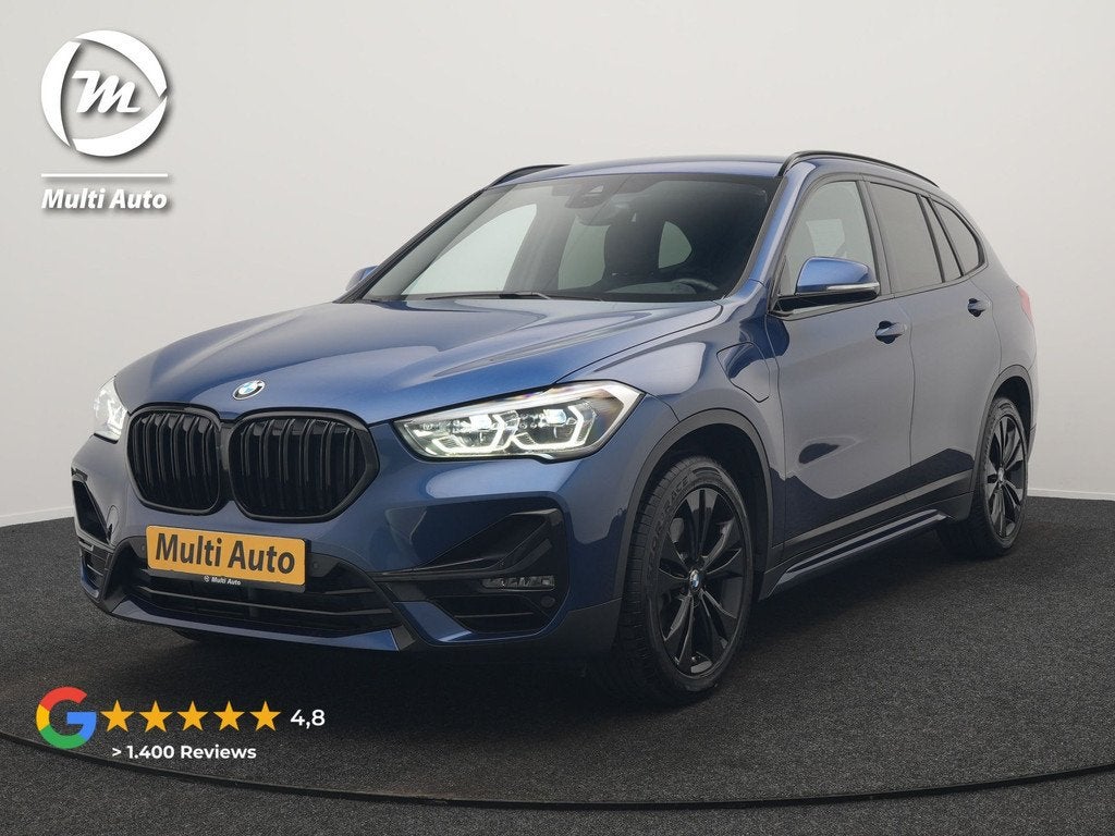 BMW X1 xDrive25e Sportline PHEV 221pk Dealer O.H. | Trekhaak, Gebruikt, Blauw, Leder en Stof, Bedrijf