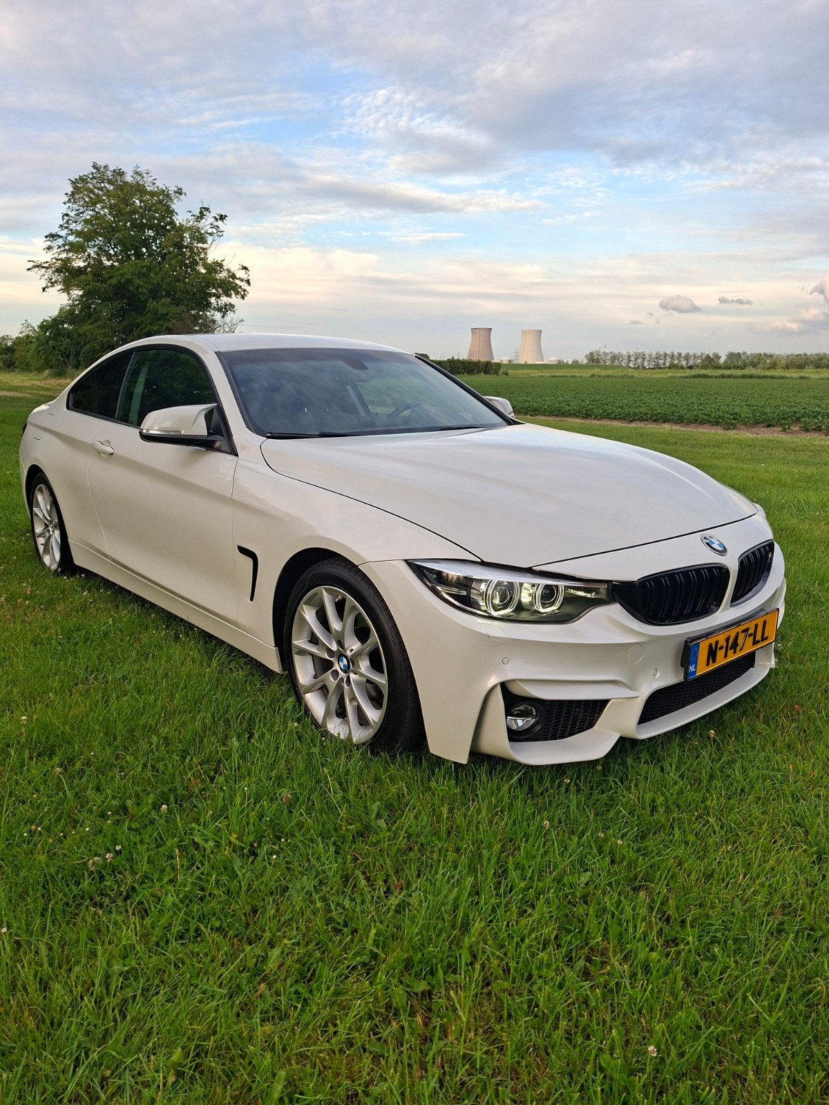 BMW 4-Serie 420i coupé Aut 2017 parelmoer wit, Automaat, 1998 cc, Achterwielaandrijving, Zwart