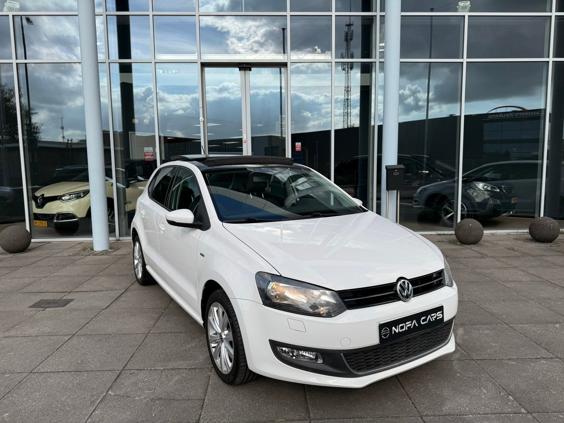 Volkswagen Polo 1.2 TSI Highline, Stof, Gebruikt, Zwart, 60 pk