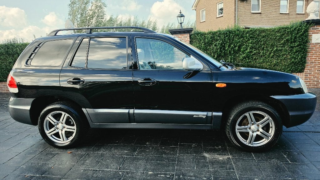 Hyundai Santa Fe 2.4 I 16V Leder ecc APK+NAP inruil mogelijk, Auto's, Voorwielaandrijving, 145 pk, Santa Fe, 4 cilinders