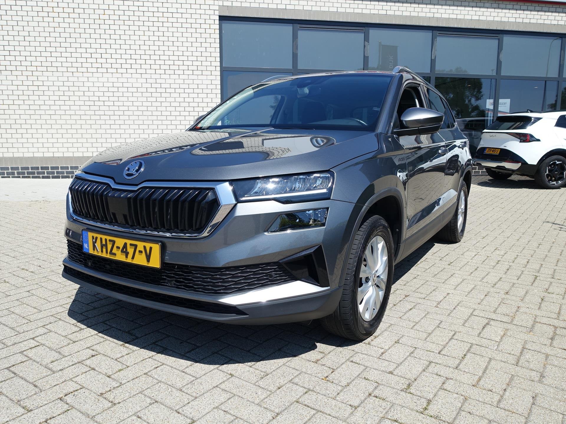 SKODA Karoq 1.5 TSI ACT Greentech 150pk Ambition Business, Auto's, 4 cilinders, Parkeersensor, Karoq, Bedrijf