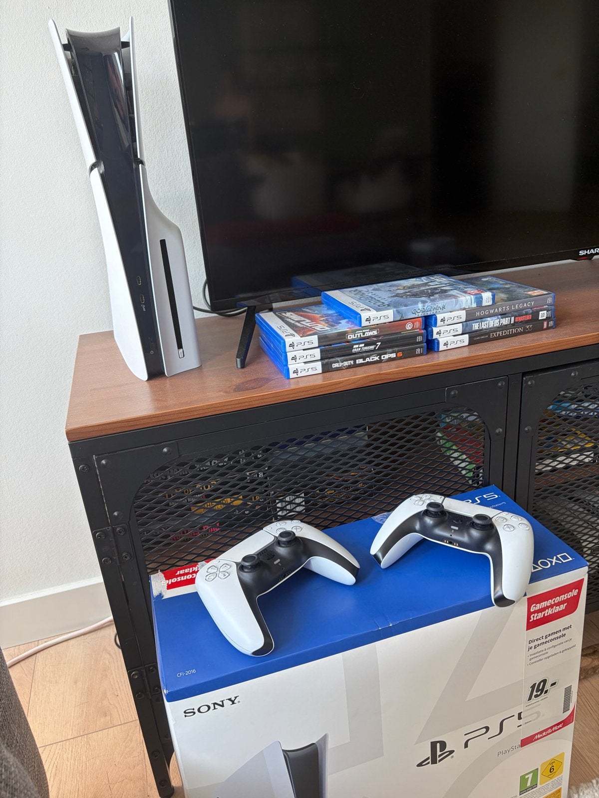 PlayStation 5 Disc Edition met 7 games en 2 controllers, Ophalen, Vanaf 18 jaar, Overige genres, 2 spelers
