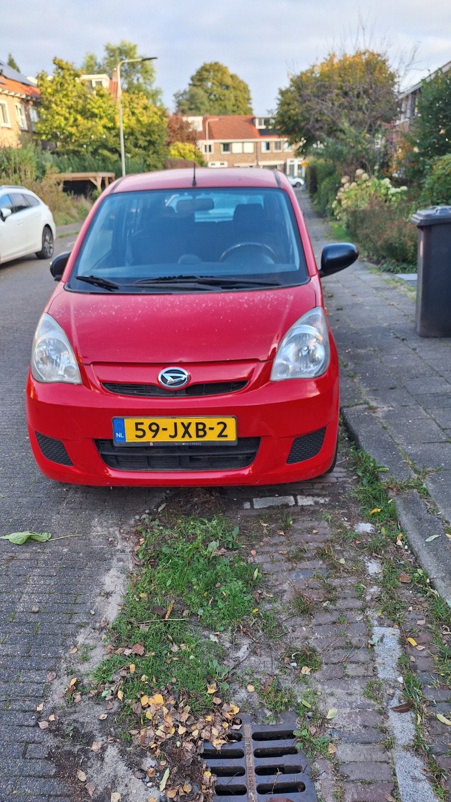 Daihatsu Cuore 1.0 5D 2009 Rood, Aico, Auto's, Voorwielaandrijving, 600 kg, 18 €/maand, 4 stoelen
