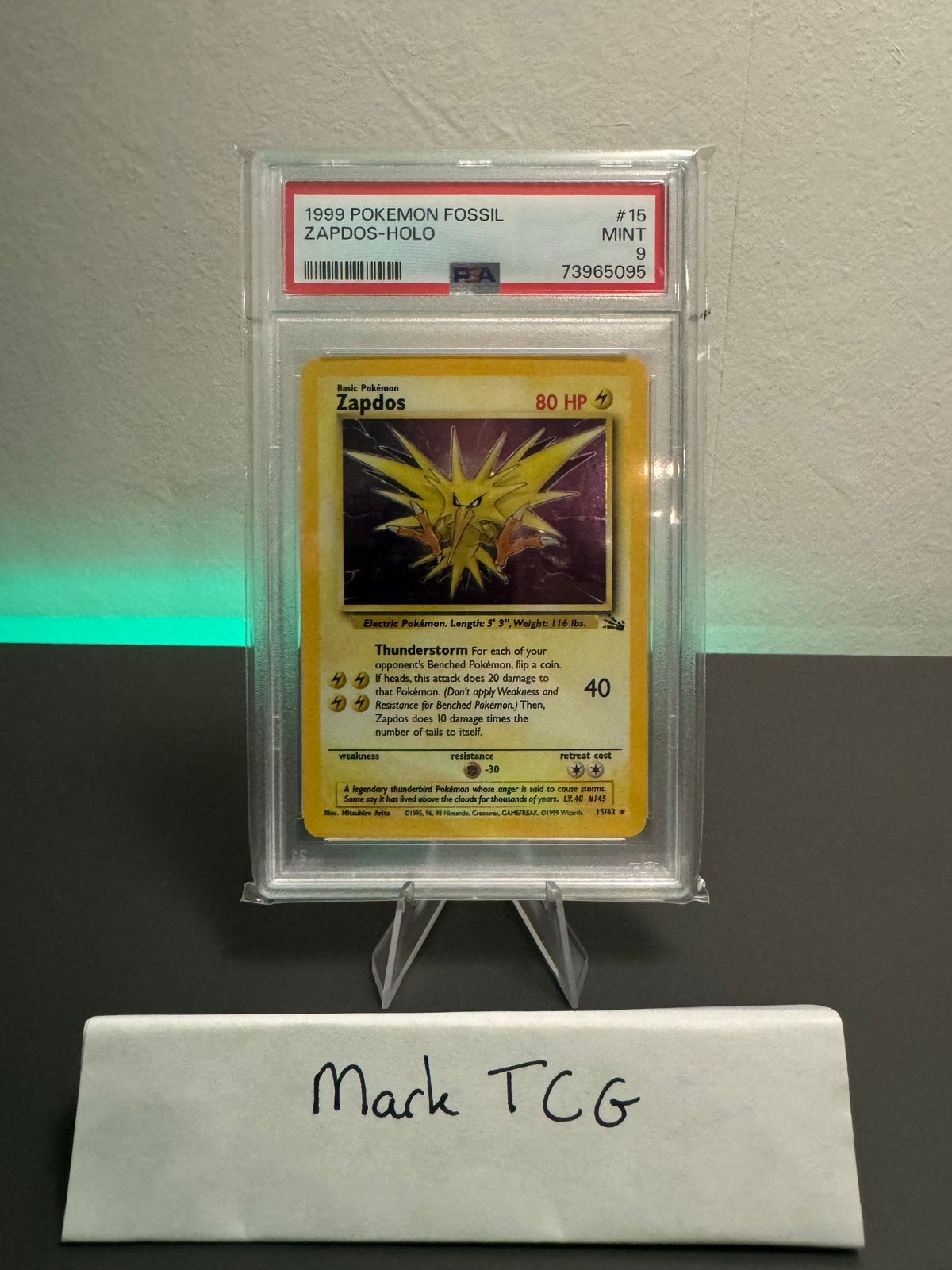 PSA 9 MINT 1999 Pokemon Fossil Zapdos Holo #15, Hobby en Vrije tijd, Verzamelkaartspellen | Pokémon, Ophalen of Verzenden, Zo goed als nieuw